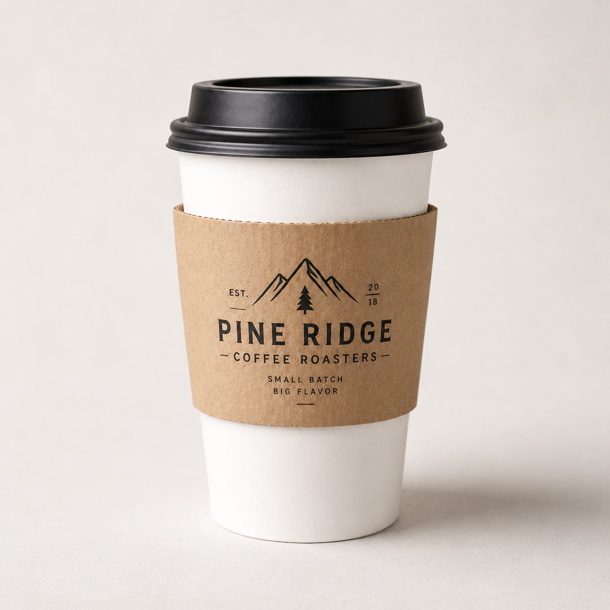 Custom printed corrugated coffee cup sleeves displayed on table