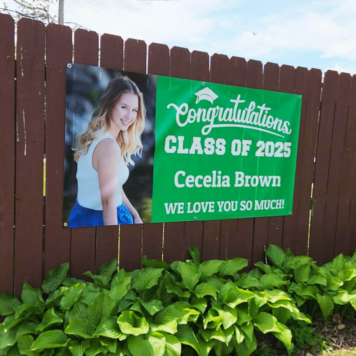 graduation-banner-hanging-at-graduation-party-green-fence-yard-3x6-feet