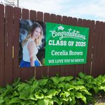 graduation-banner-hanging-at-graduation-party-green-fence-yard-3x6-feet