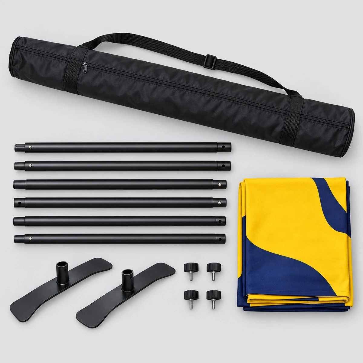 Slider backdrop kit laid flat: black travel bag, six frame tubes, two feet, four knobs and folded fabric graphic