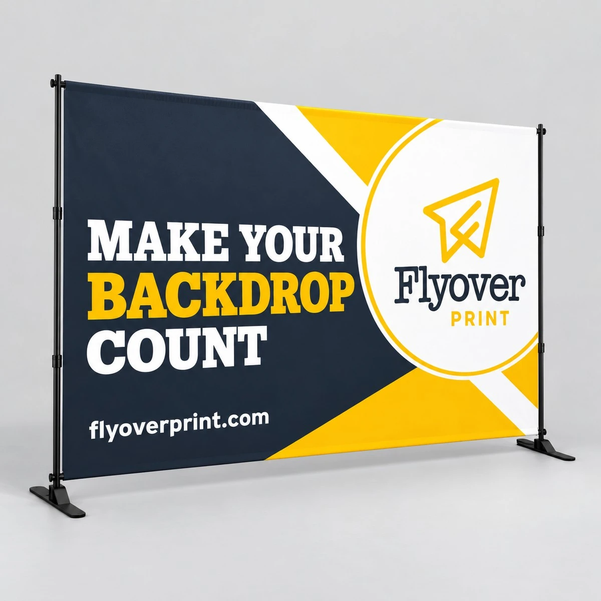 10 ft Flyover Print slider backdrop in navy and gold reading Make Your Backdrop Count on a gray studio floor
